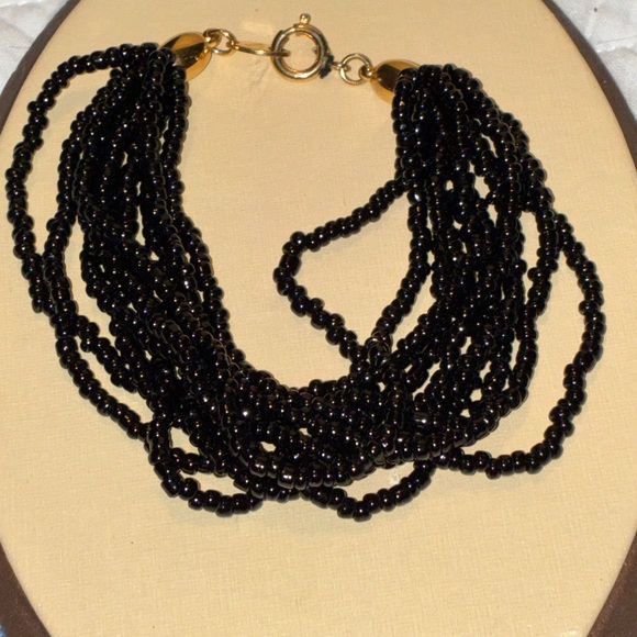 Trifari Jewelry - L Lovely Trifari Vintage Black Beaded Bracelet With Gold Tone Caps